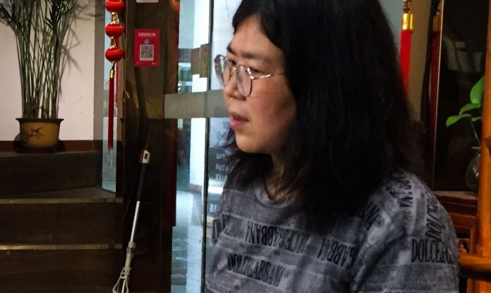 zhang_zhan_jornalista_chinamcajr_2812203594